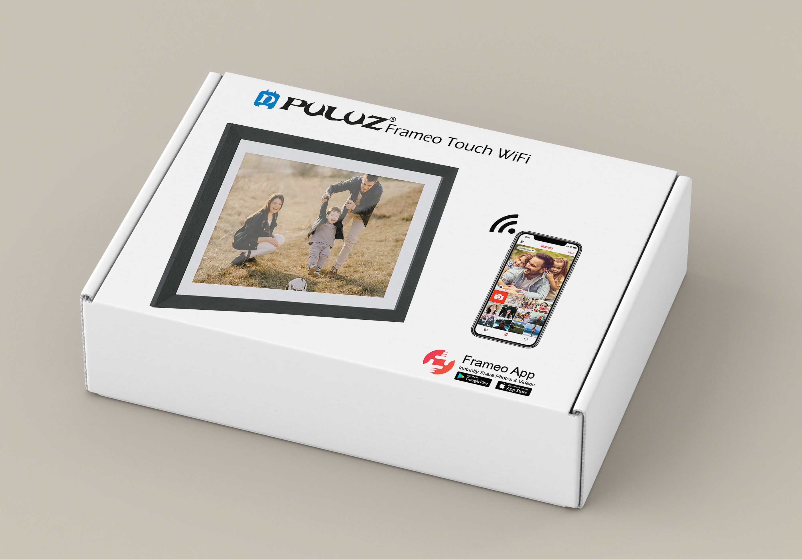 Boîte avec cadre photo et smartphone. Cadre montre une famille. Smartphone affiche une application.