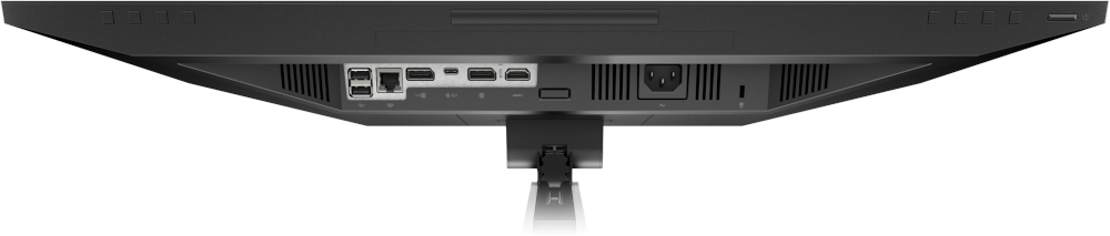 The back of a black computer monitor with various ports and a stand.