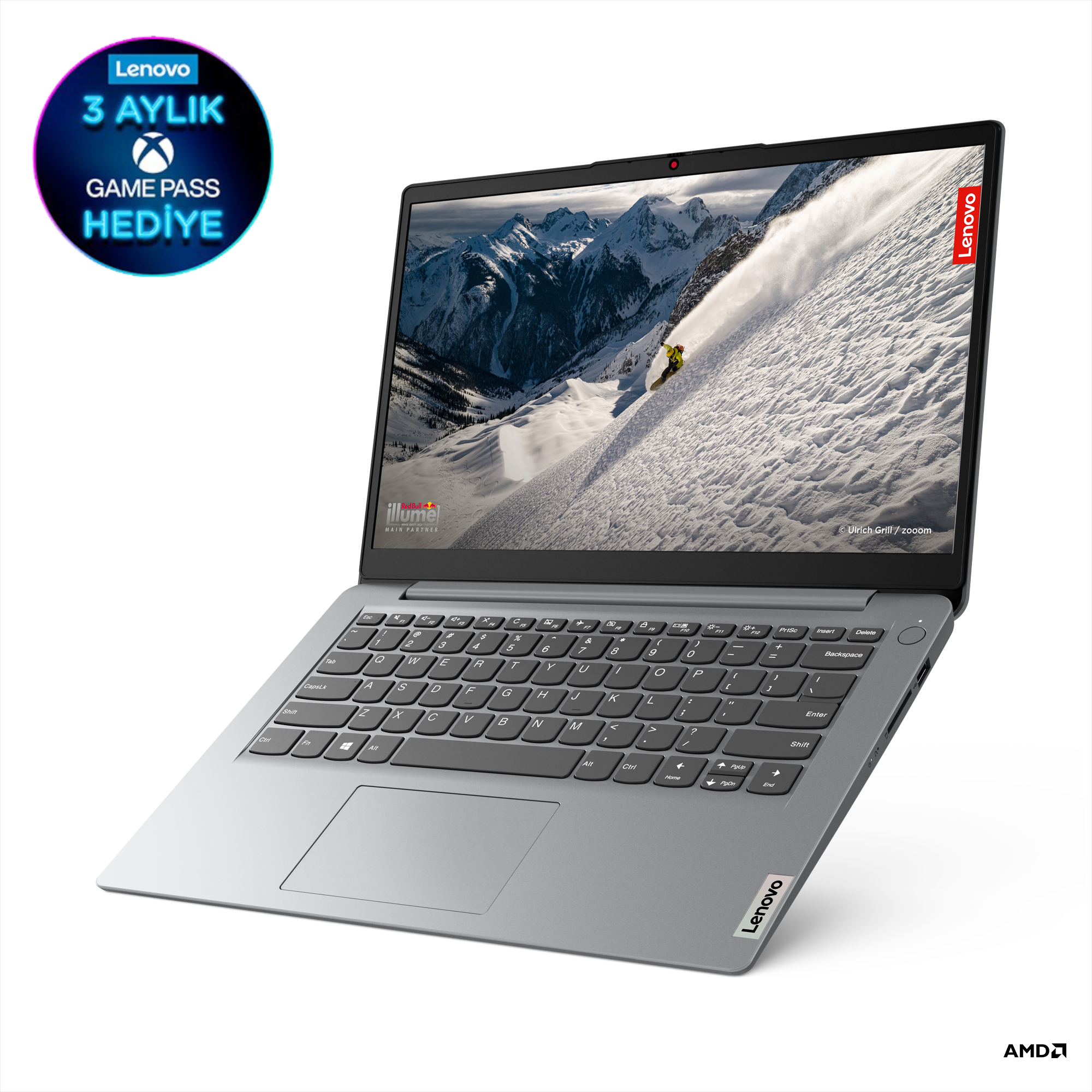 Ekranında kar manzarası ve Lenovo logosu bulunan gümüş dizüstü bilgisayar, Game Pass teklifiyle.