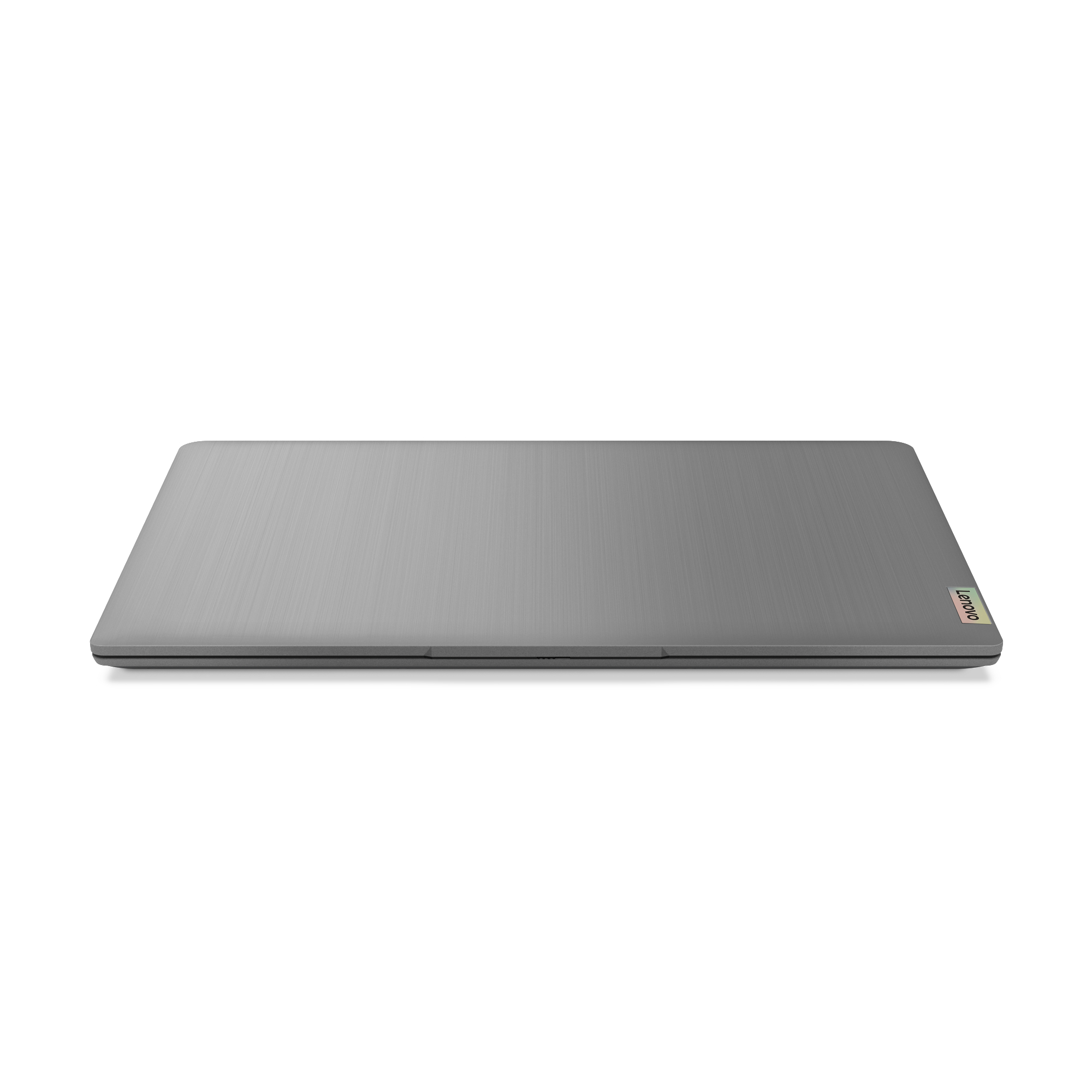 Ein silberner Lenovo Laptop, geschlossen, auf weißem Hintergrund.
