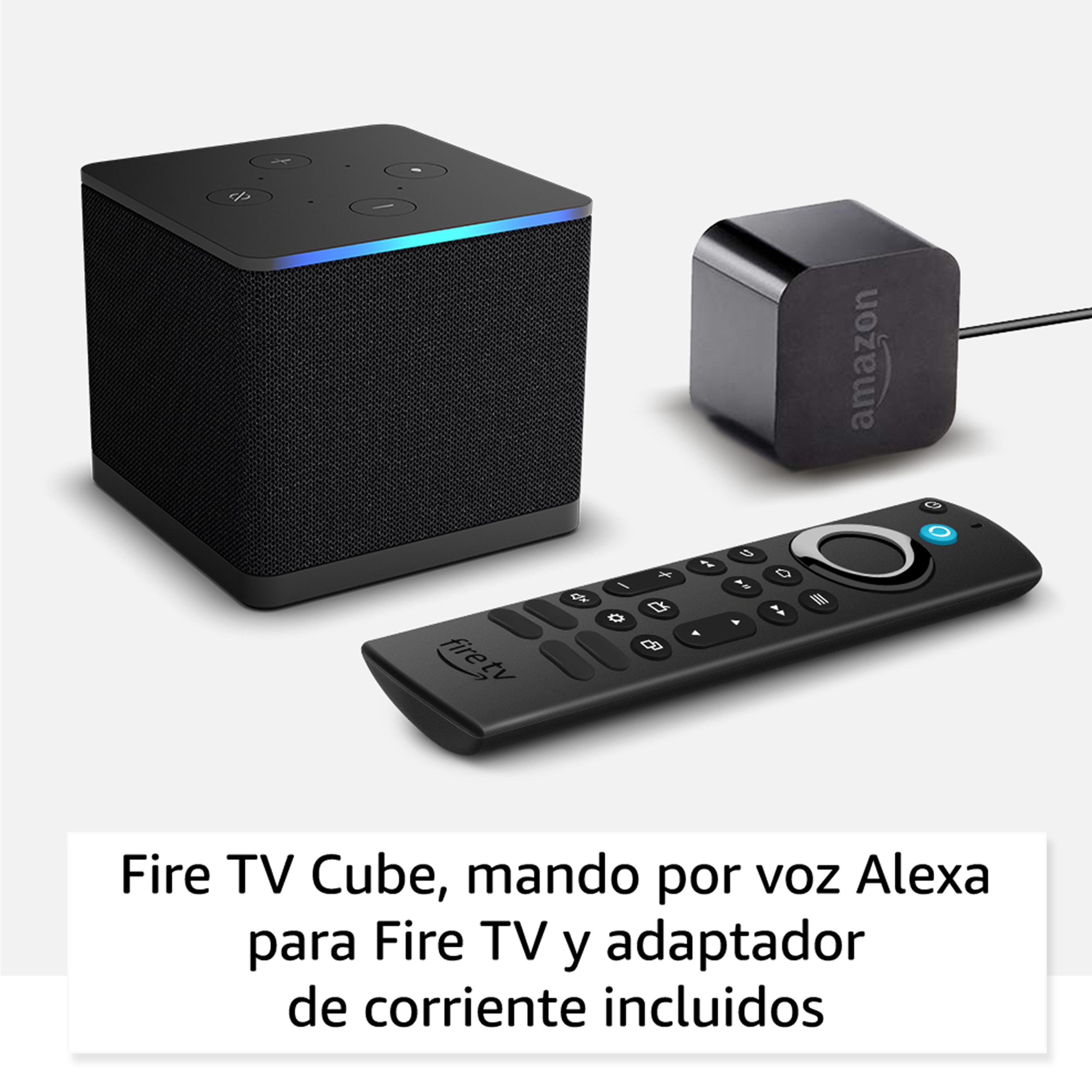Fire TV Cube negro, mando por voz y adaptador sobre fondo blanco.