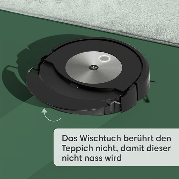 Ein schwarzer Roboter-Staubsauger auf einer grünen Oberfläche. Er hat eine silberne Mitte und eine weiße Textbox.