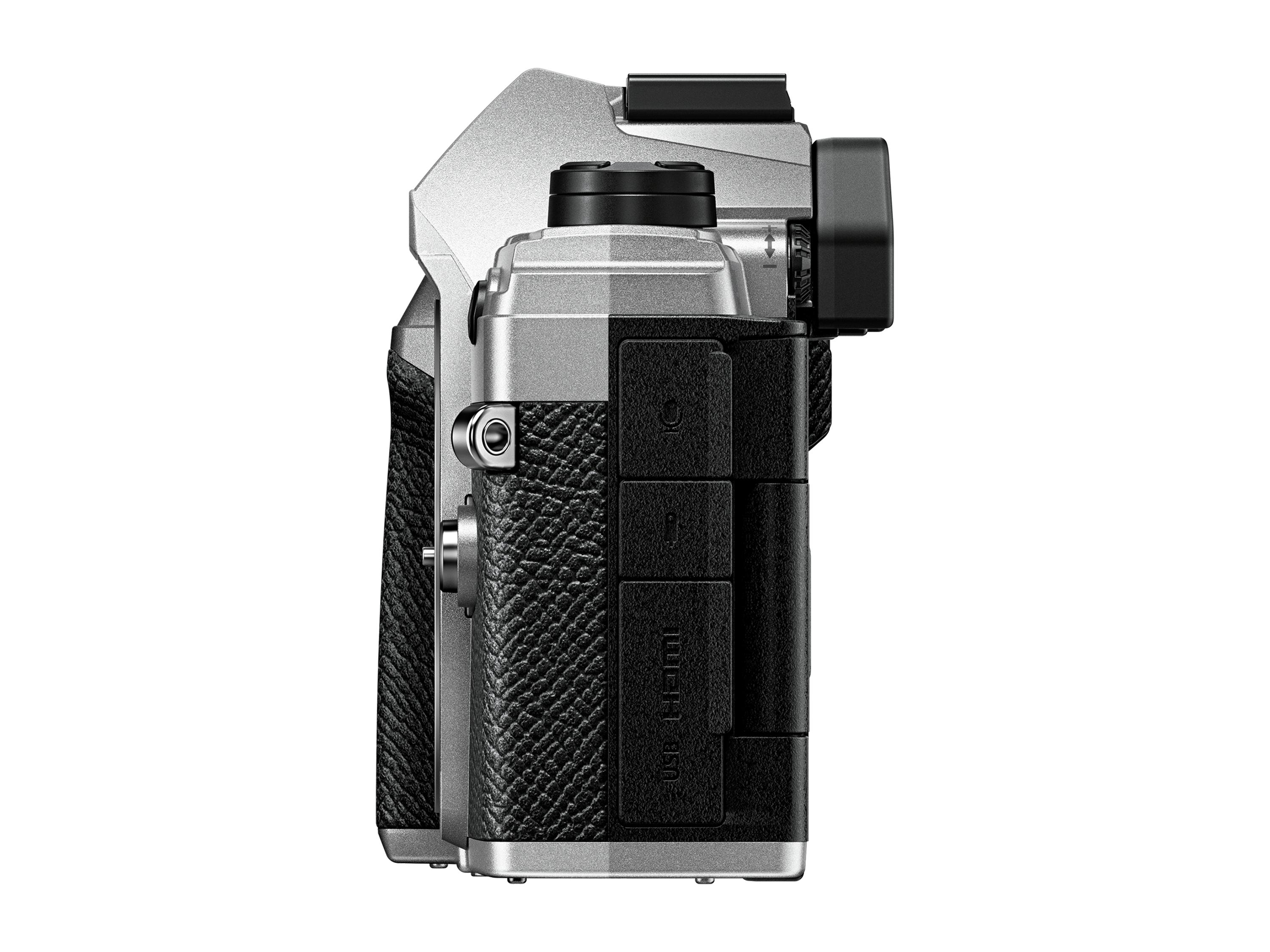 Eine silberne und schwarze Kamera, Seitenansicht, mit strukturiertem Griff und USB/HDMI-Anschlüssen.