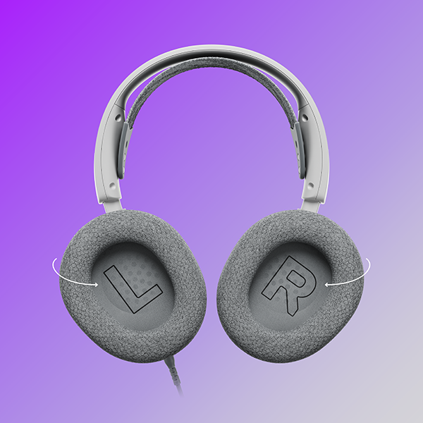 Casque gris avec lettres L et R sur les écouteurs, fond violet.