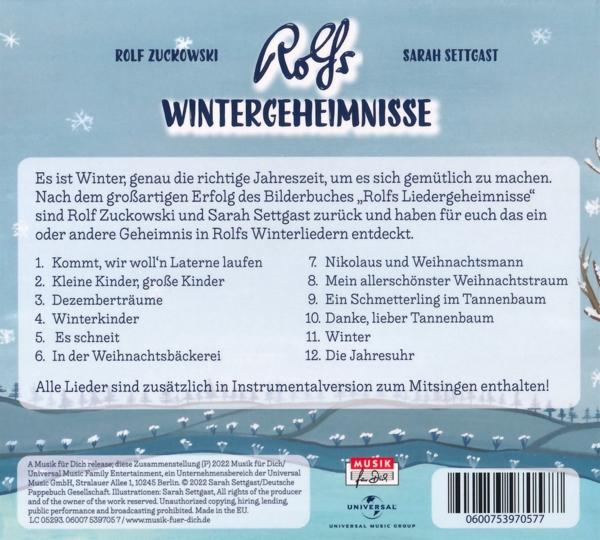 Rückseite einer CD mit Liedtexten und einer Berglandschaft.