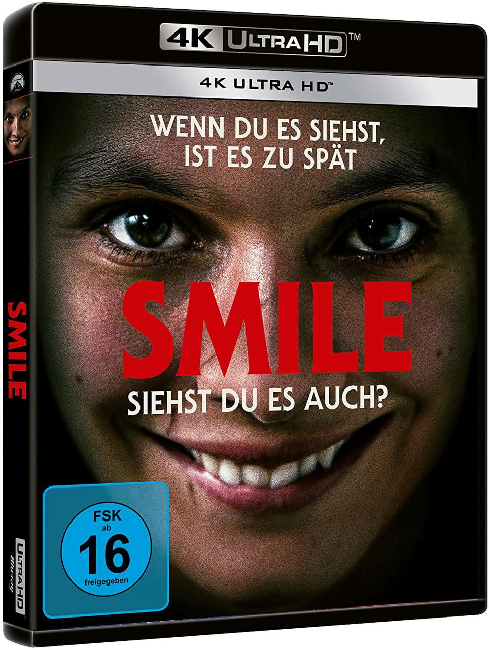 Filmcover, lächelndes Gesicht mit dem Titel „SMILE“ darauf.