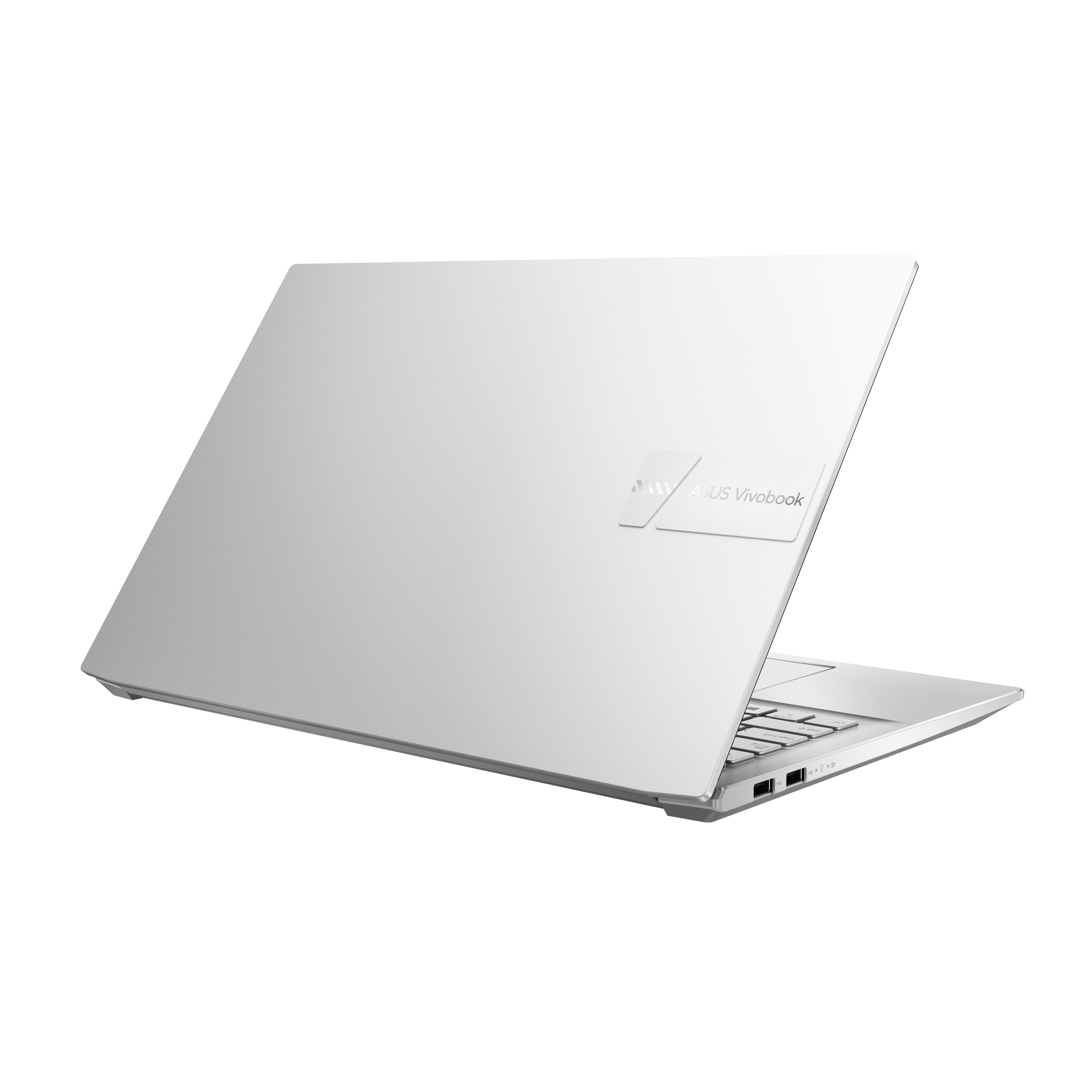Ordenador portátil plateado, vista en ángulo, abierto. Logotipo ASUS Vivobook en la parte trasera. Fondo blanco.
