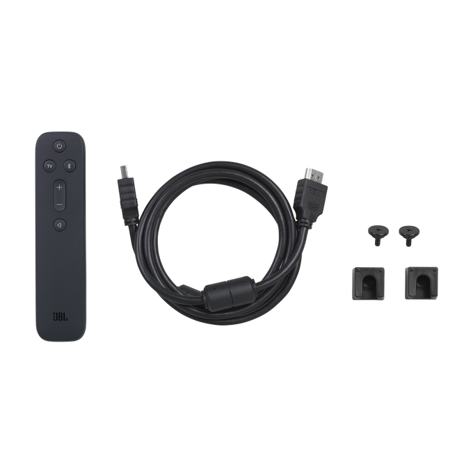 Mando a distancia, cable y soportes de montaje para una barra de sonido, sobre superficie blanca.