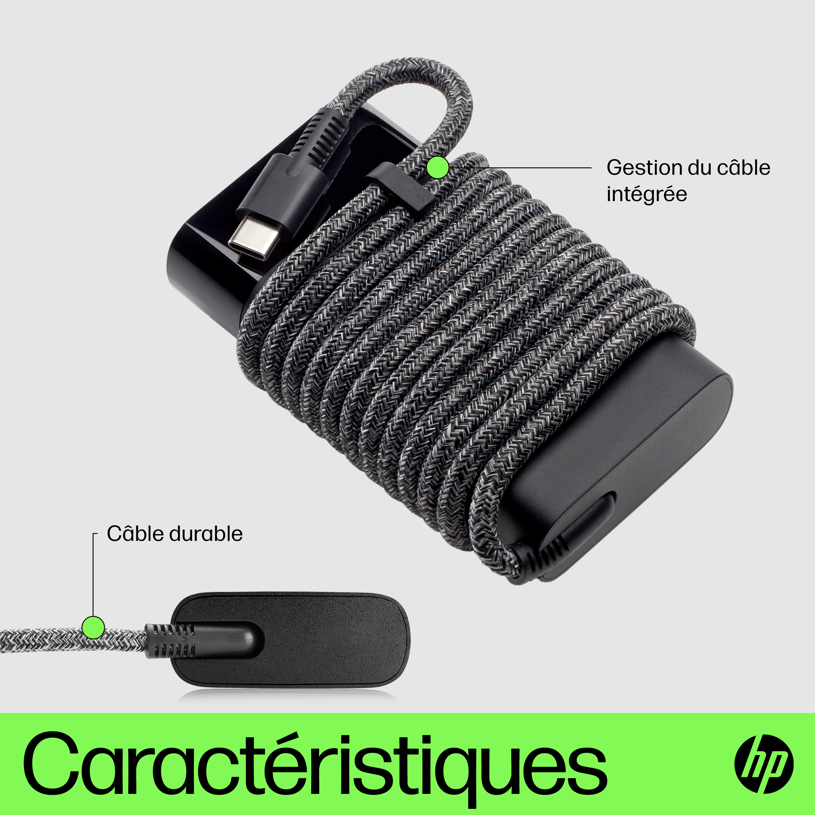 Black and gray braided HP USB-C cable with cable management.