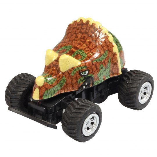 Ein Spielzeug-Triceratops-Dinosaurier auf einem schwarzen Fahrgestell mit Rädern.