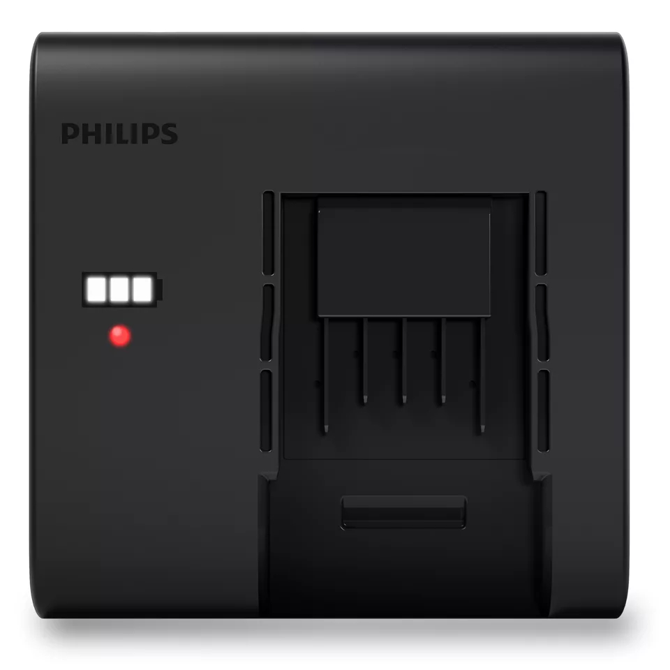 Schwarze Philips Ladestation. Sie hat eine Batterieanzeige und ein rotes Licht. Die Oberfläche ist flach.