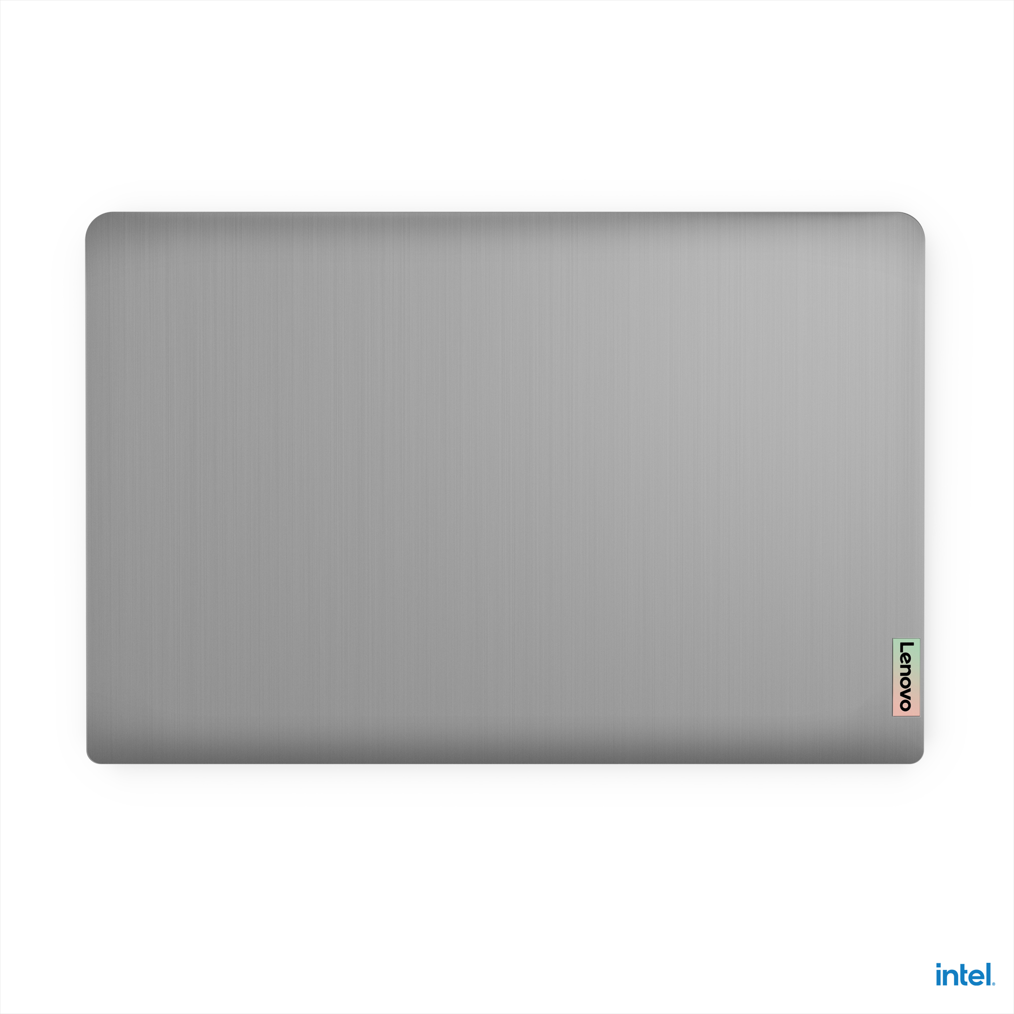 Gümüş renkli bir Lenovo dizüstü bilgisayarın üstten görünümü. Lenovo logosu sağ tarafta.