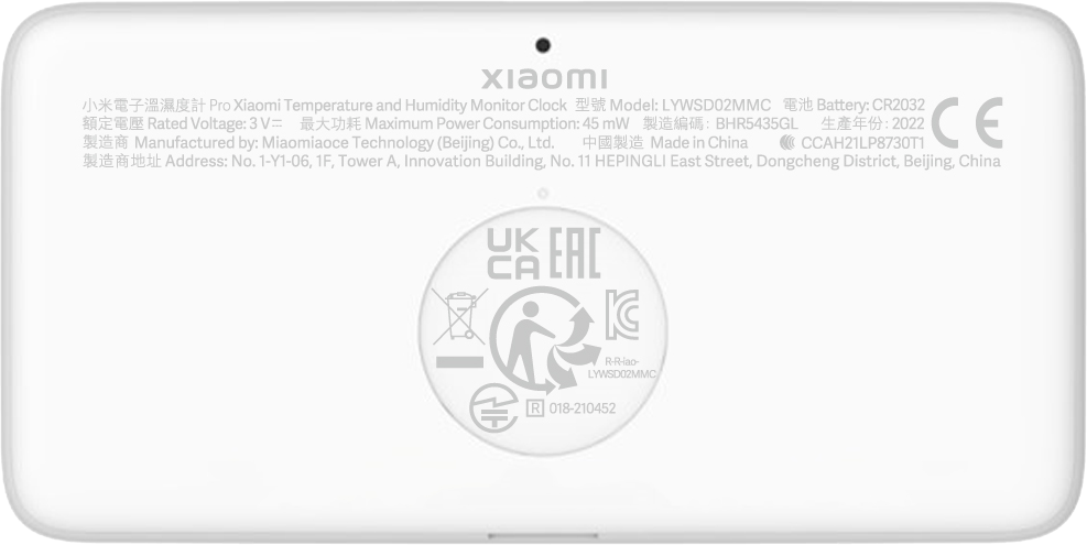 Fehér Xiaomi hőmérséklet-monitor szöveggel és szimbólumokkal.