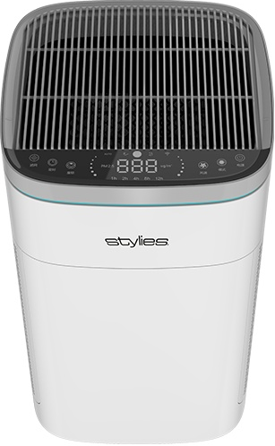 Purificateur d'air blanc avec dessus et écran noirs, sur fond blanc.