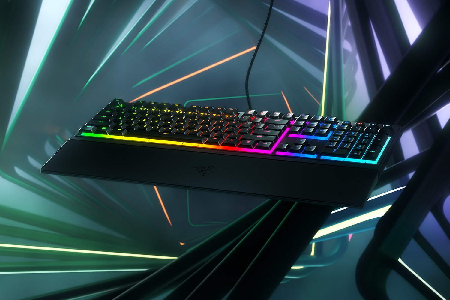 Black keyboard with rainbow-lit keys on a futuristic background.