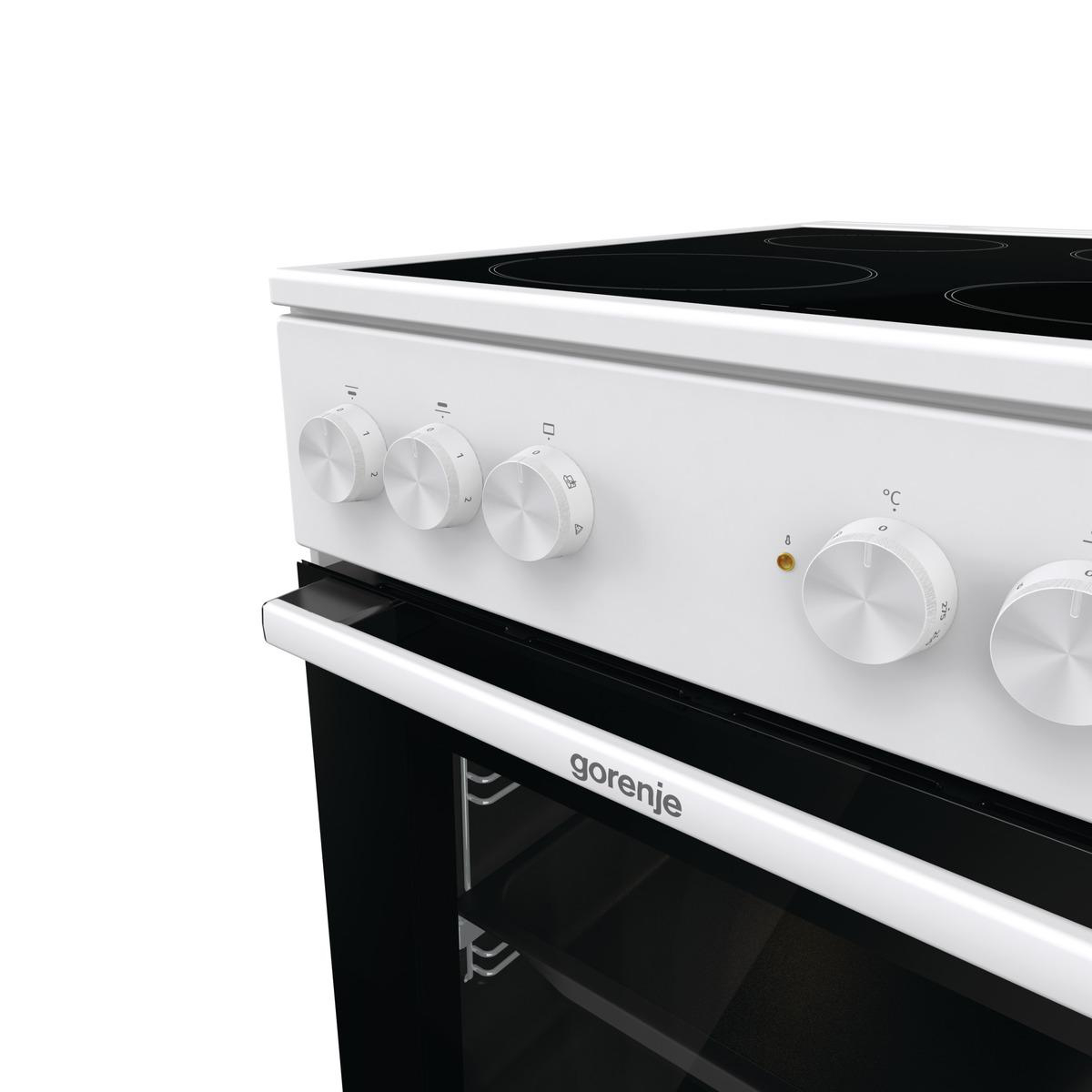 Weißer Ofen mit Knöpfen und einem Griff, Marke Gorenje.