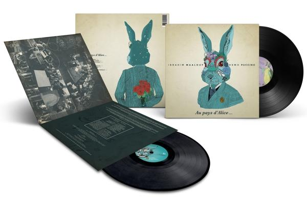 Vinyl lemezek és album borítók, egy nyúllal, aki öltönyt és virágokat visel.