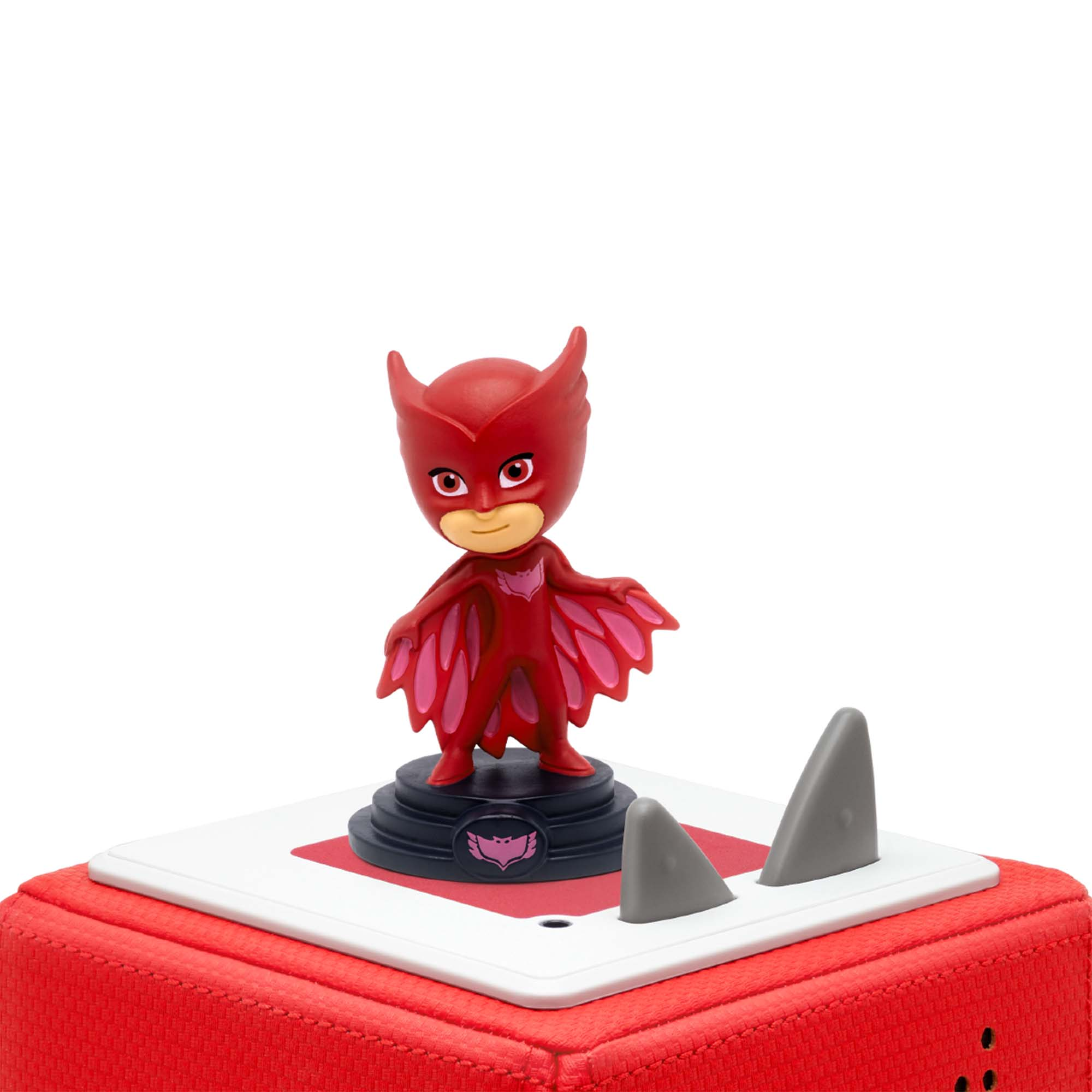 Rote Cartoonfigur auf roter und weißer Basis mit Haifischflossen.