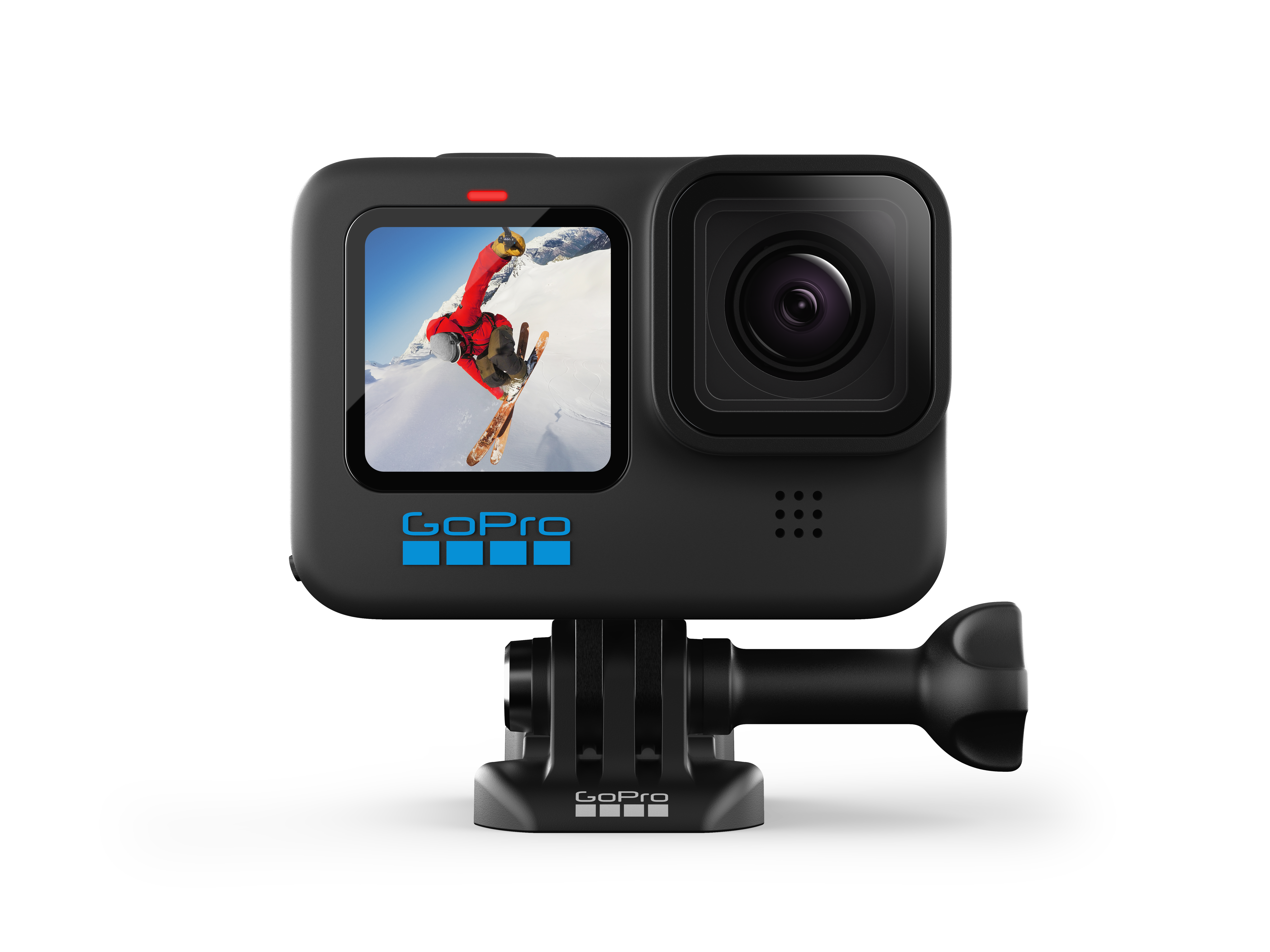 Cámara de acción GoPro, negra, con una pantalla que muestra a un esquiador. Se apoya en un soporte.