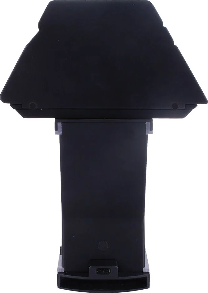 Schwarzes Gerät mit rechteckiger Oberseite, auf einem Ständer montiert, mit USB-Anschluss.