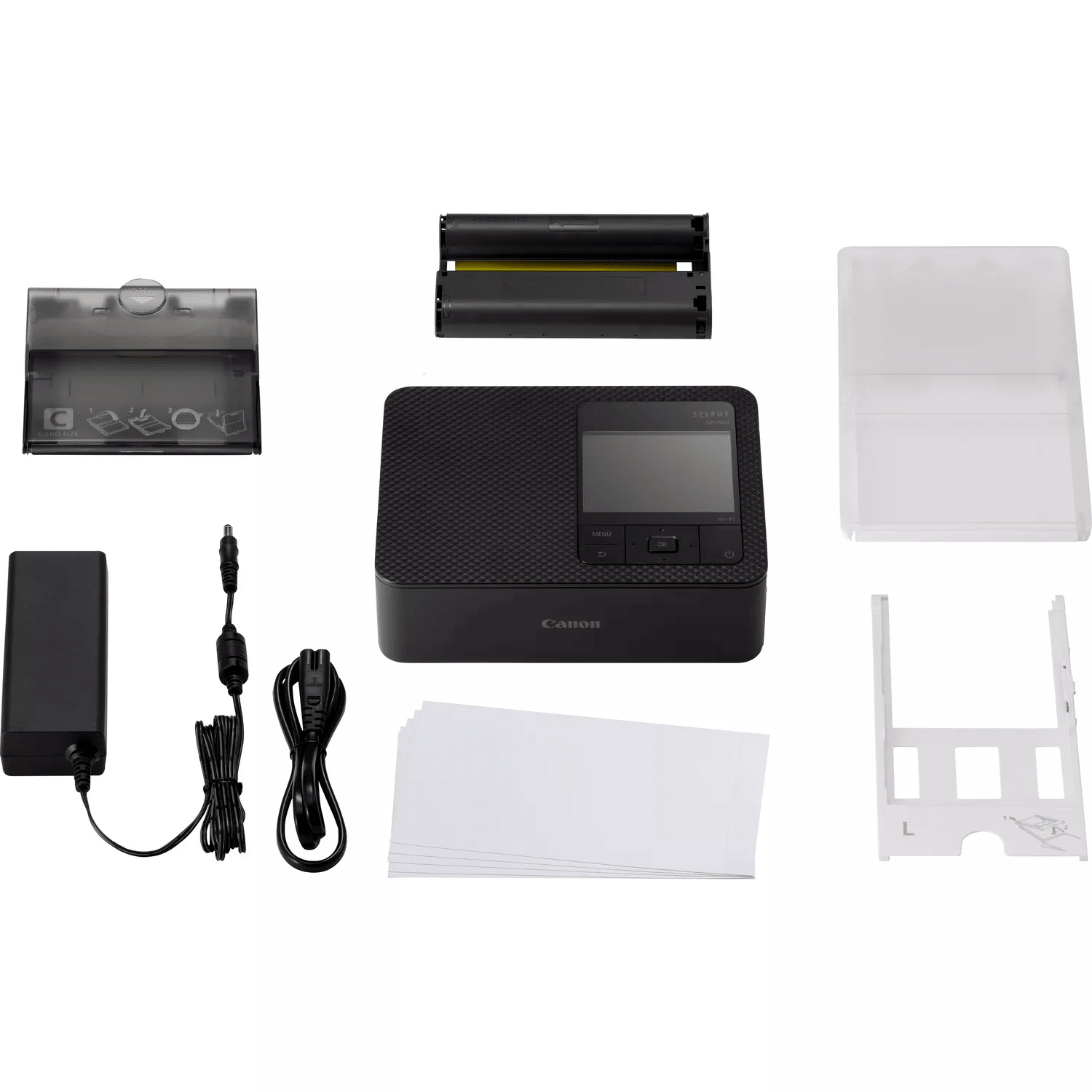 Canon SELPHY Fotodrucker mit Zubehör. Enthält ein Netzteil und Papier.