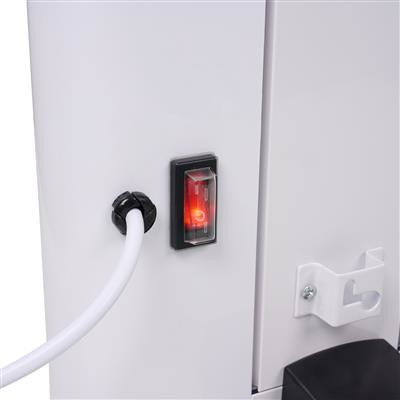 White appliance with a red power switch. The switch is illuminated, indicating power is on.
