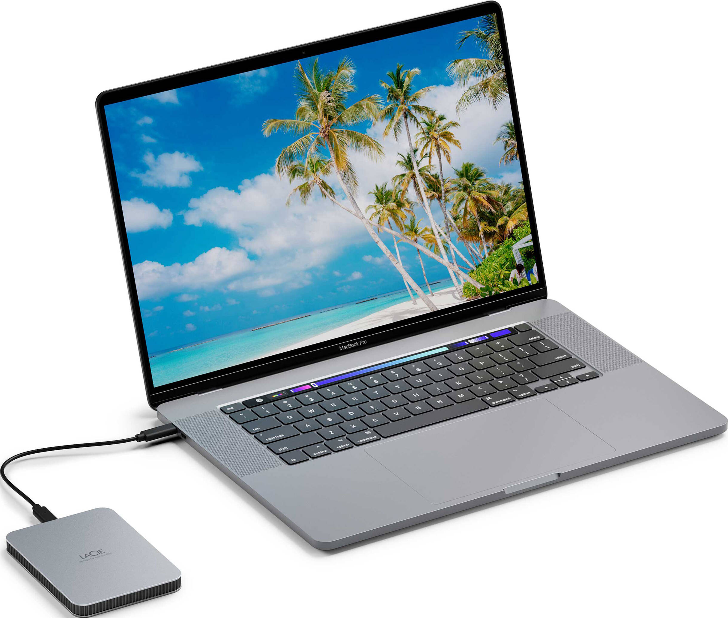 Laptop mit angeschlossener Festplatte, geöffnet, mit tropischem Strandbildschirm.