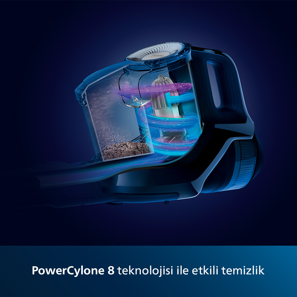Hareket halinde mavi ve siyah elektrikli süpürge.