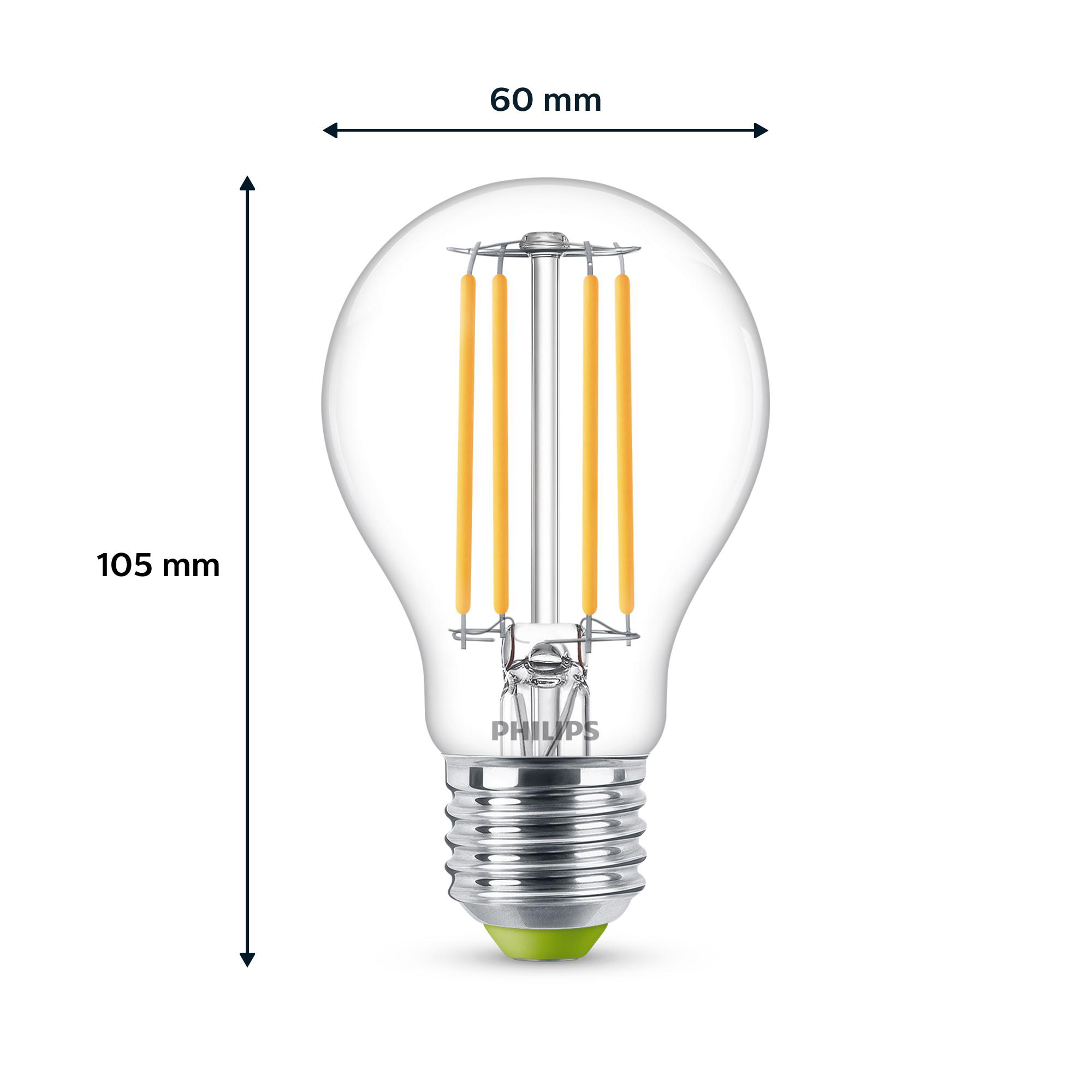Eine klare Glühbirne mit orangefarbenen vertikalen Filamenten. Es ist eine Philips-Markenbirne.