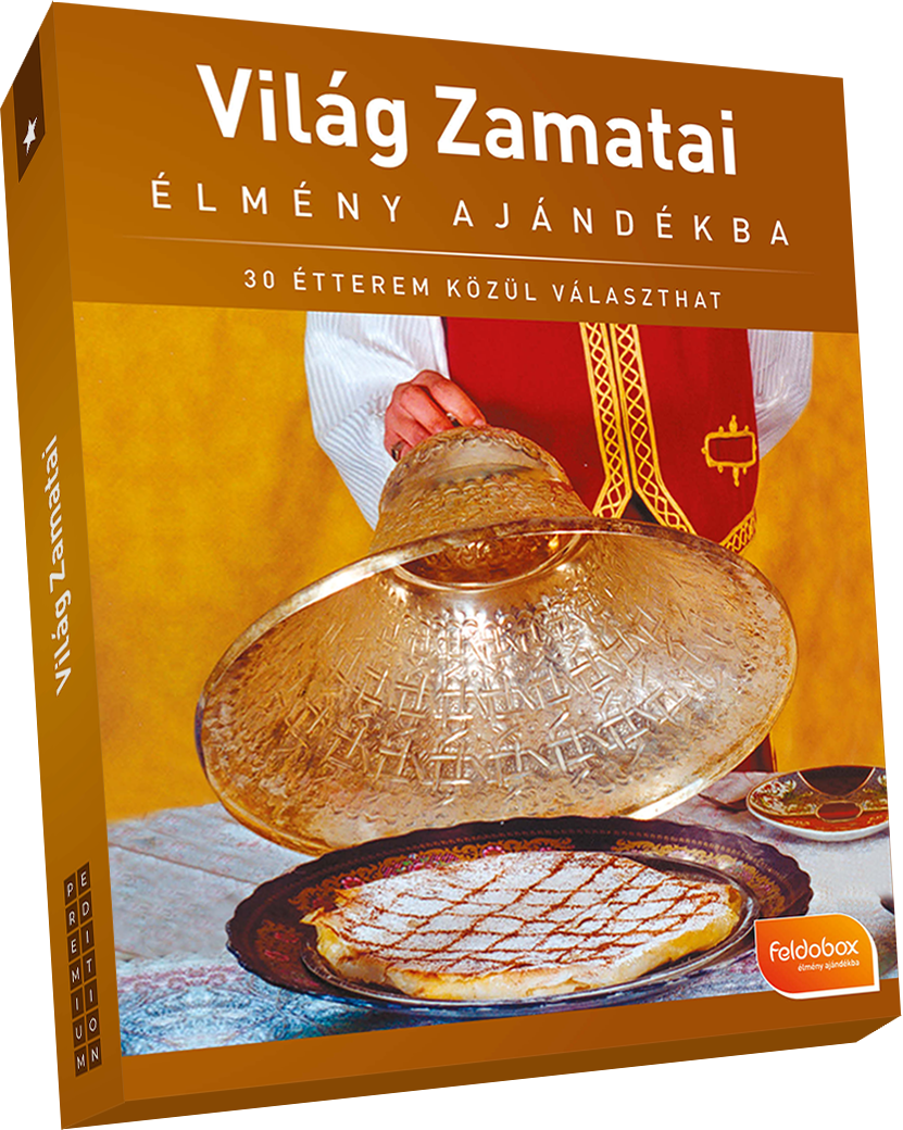 Doboz társasjátékkal, kéz tartja a fedőt a tányér fölött.
