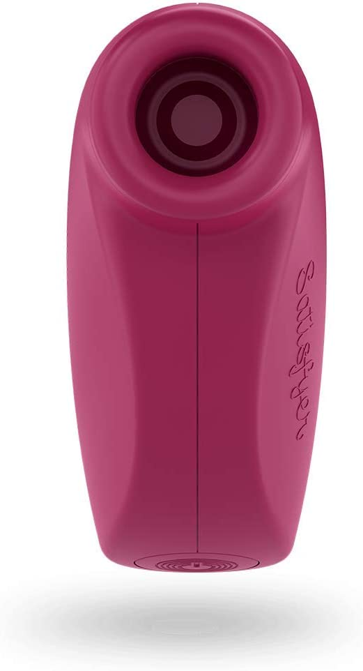 Un juguete sexual rosa. Forma redondeada con un agujero en la parte superior.