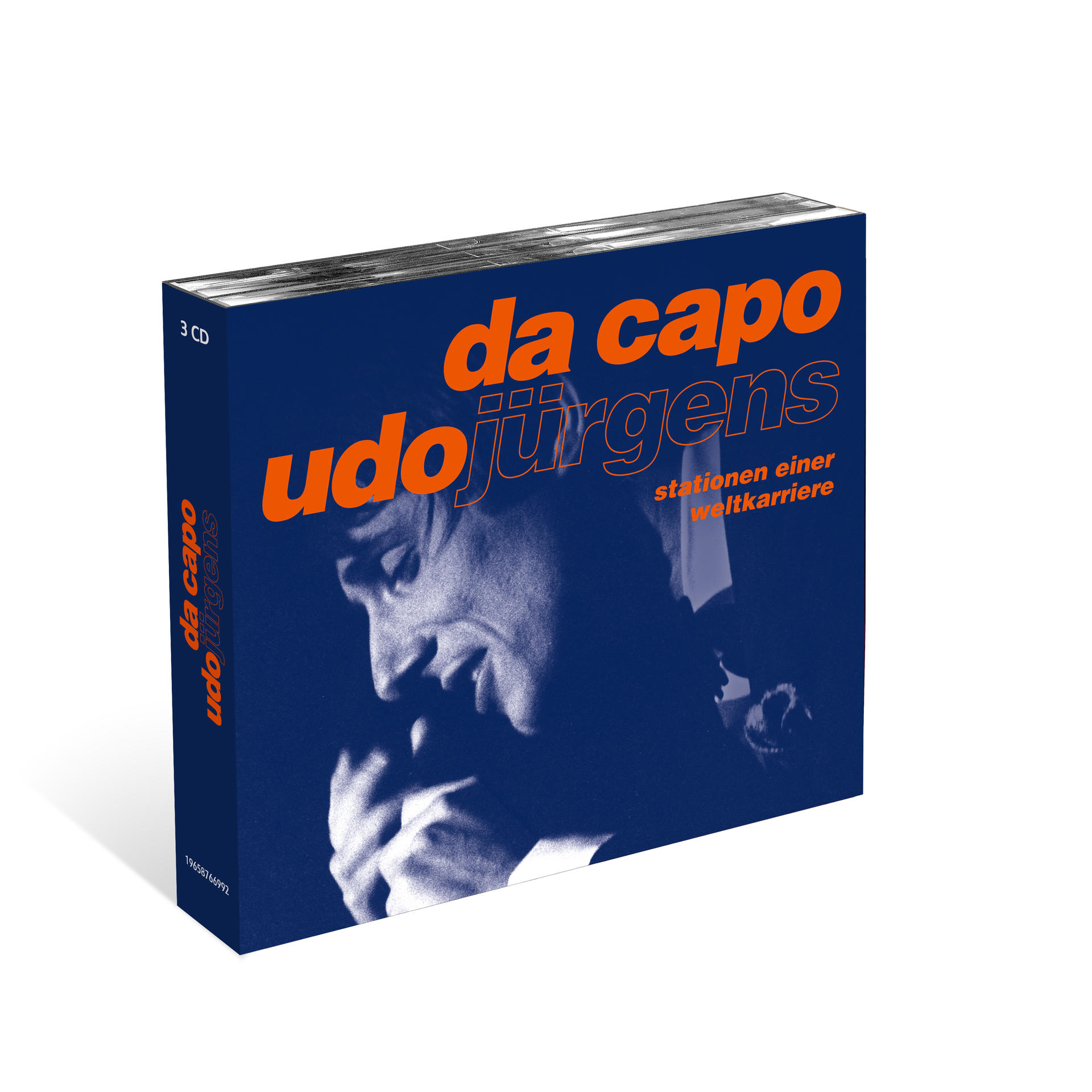CD-Box-Set in Marineblau mit orangefarbenem Text, mit Udo Jürgens und dem Wort 'da capo'.