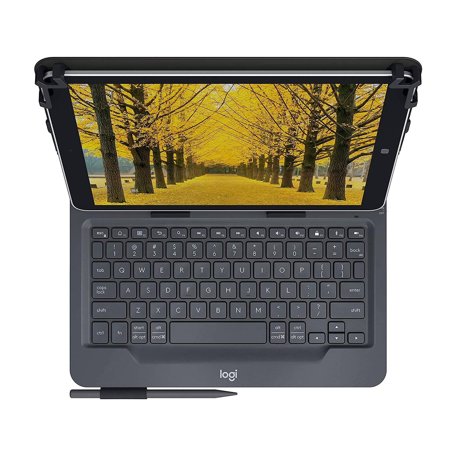 Tablet con tastiera e stilo, aperto, mostra un percorso con foglie gialle.