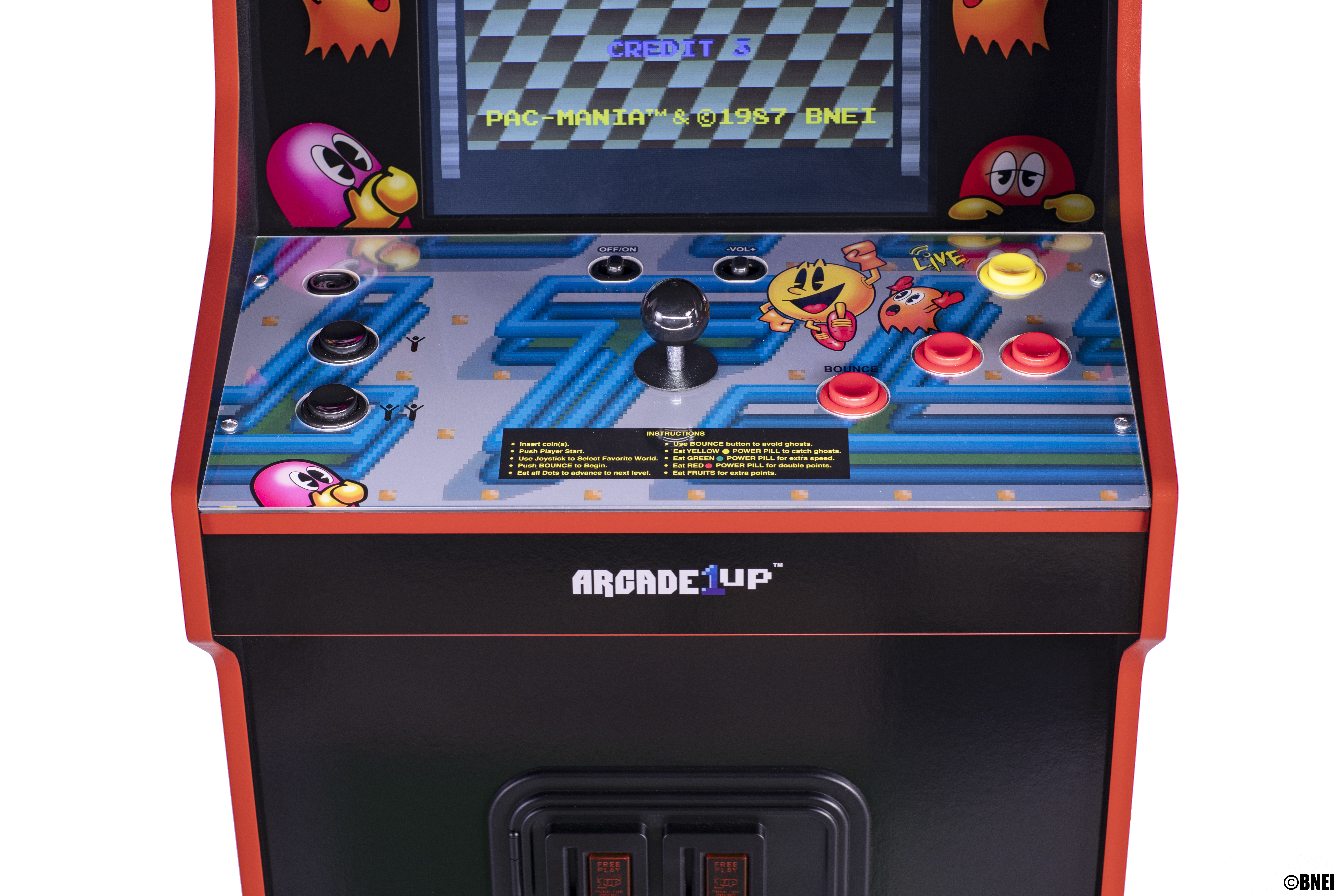 Arcade-Maschine Bedienfeld mit Pac-Man-Grafiken und Knöpfen.