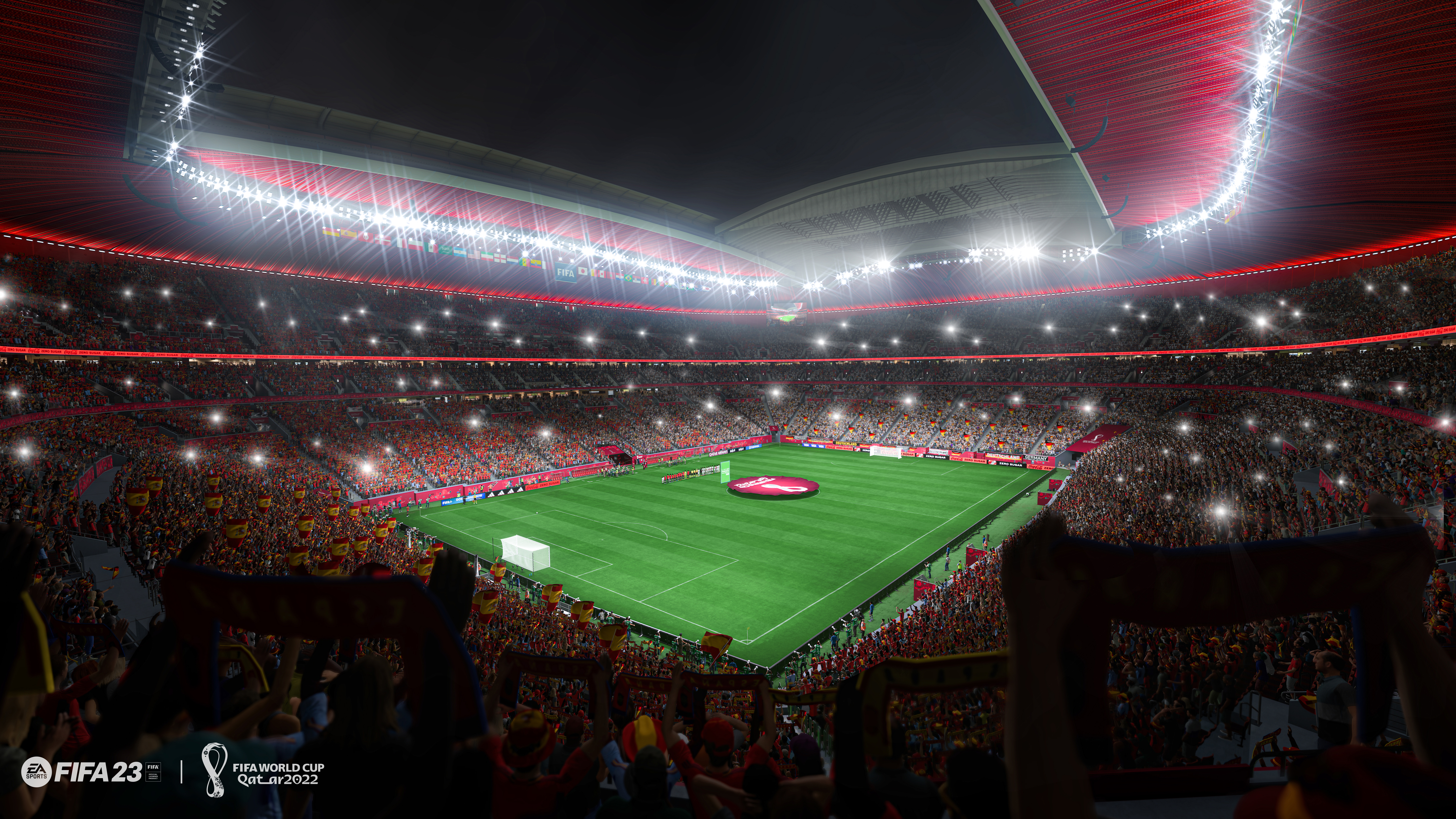 Un stade avec un terrain vert est rempli de spectateurs. Le toit est rouge. Des lumières vives illuminent le terrain.
