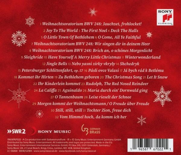 Rotes Albumcover mit weißem Text und einer Titelliste. Schneeflocken und ein Stern sind vorhanden.