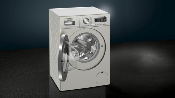 Siemens çamaşır makinesi, kapısı açık, koyu gri bir arka plan üzerinde.