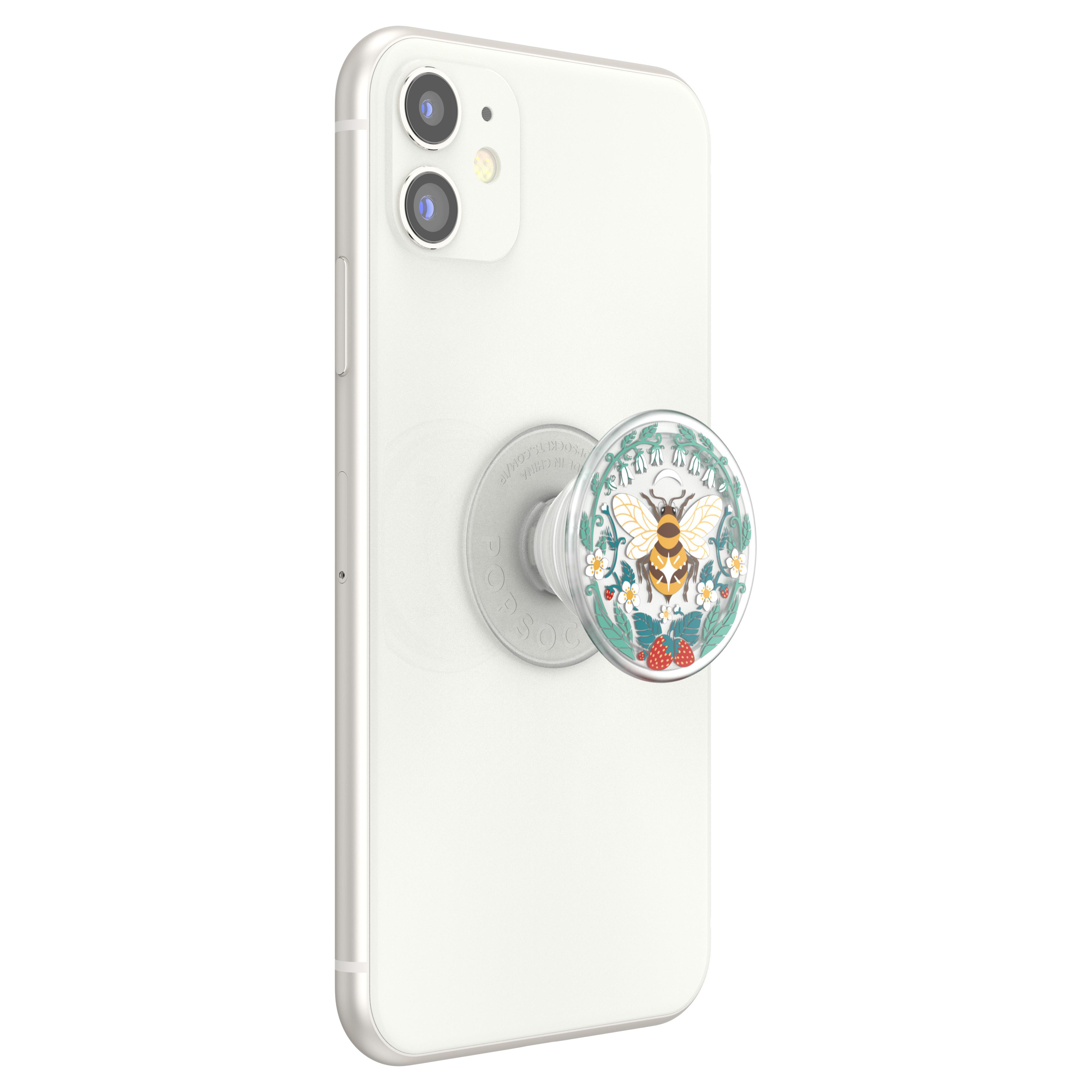 Weißes Telefon mit einem befestigten PopSocket mit Biene. Der PopSocket hat ein Bienen-, Blumen- und Erdbeer-Design.