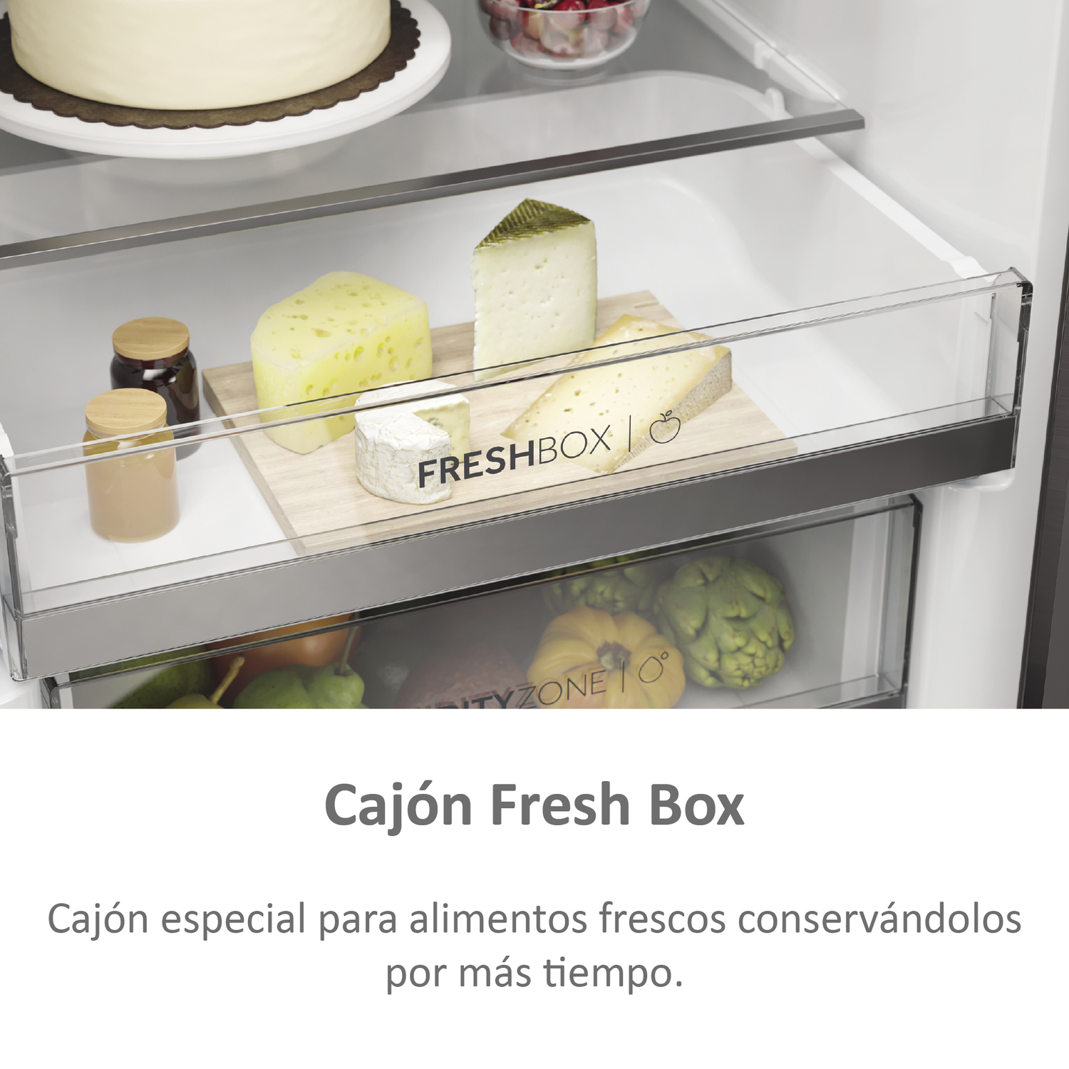 Un cajón de refrigerador con queso, mermelada y otros alimentos. Texto: Fresh Box.