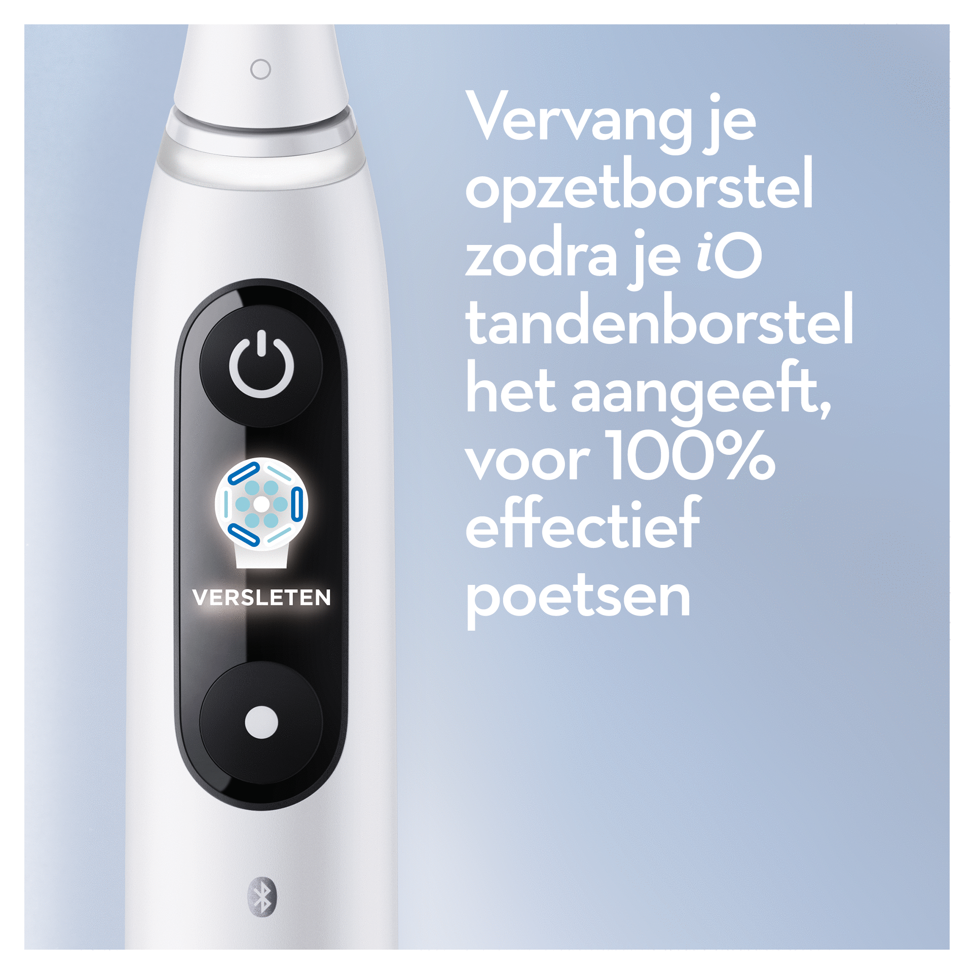 White electric toothbrush with display showing replacement needed.