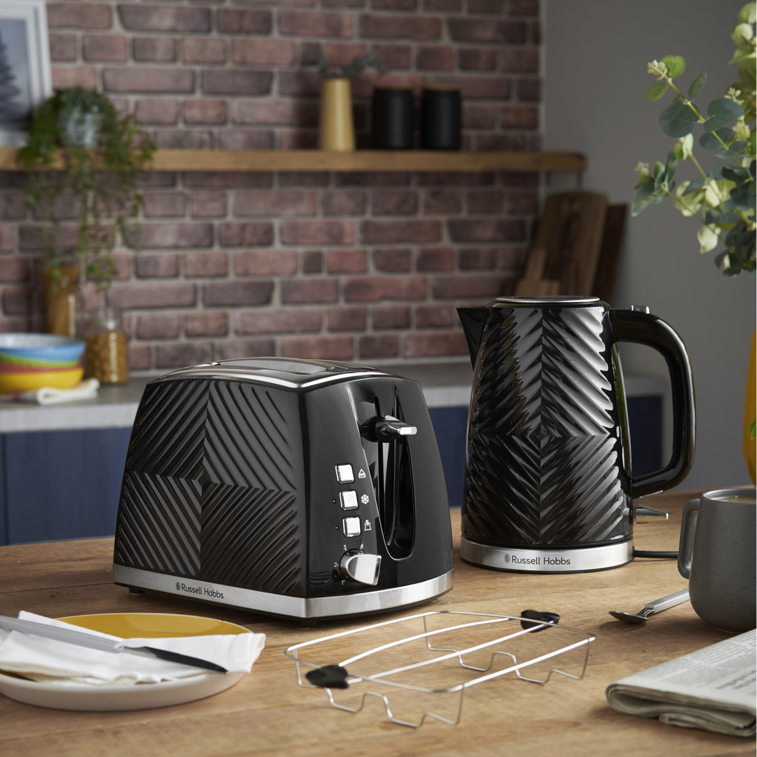 A smartwatch with a blue braided band, against a white background.