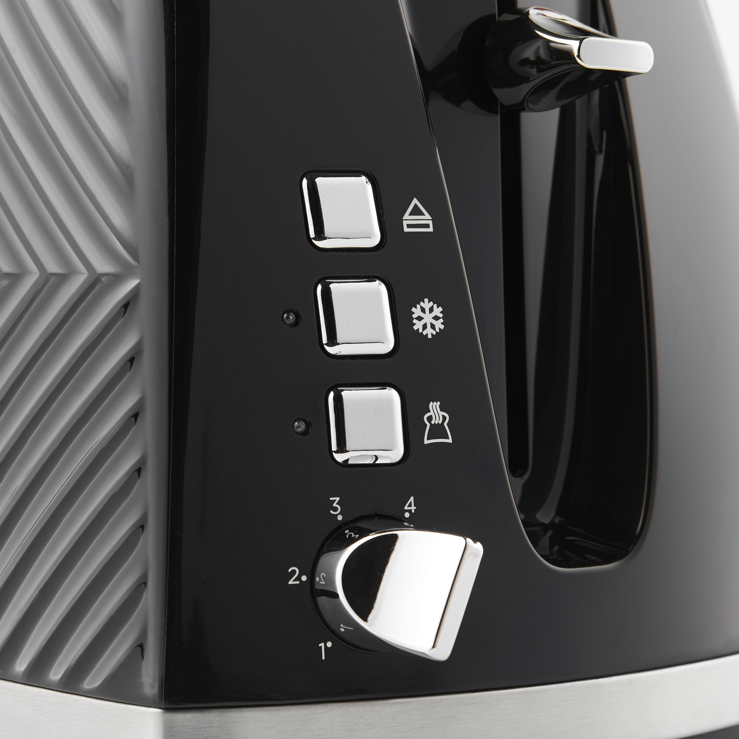 Black toaster front view, with buttons and dial. Silver accents, on white background.