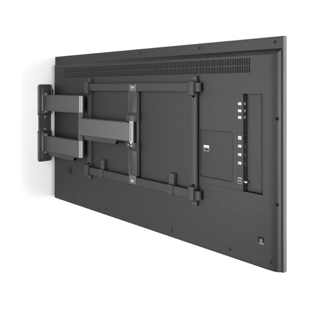 TV montado en pared con soportes, vista trasera.