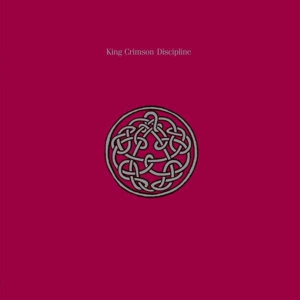 Rózsaszín album borító, King Crimson Discipline, kör alakú dizájnnal.