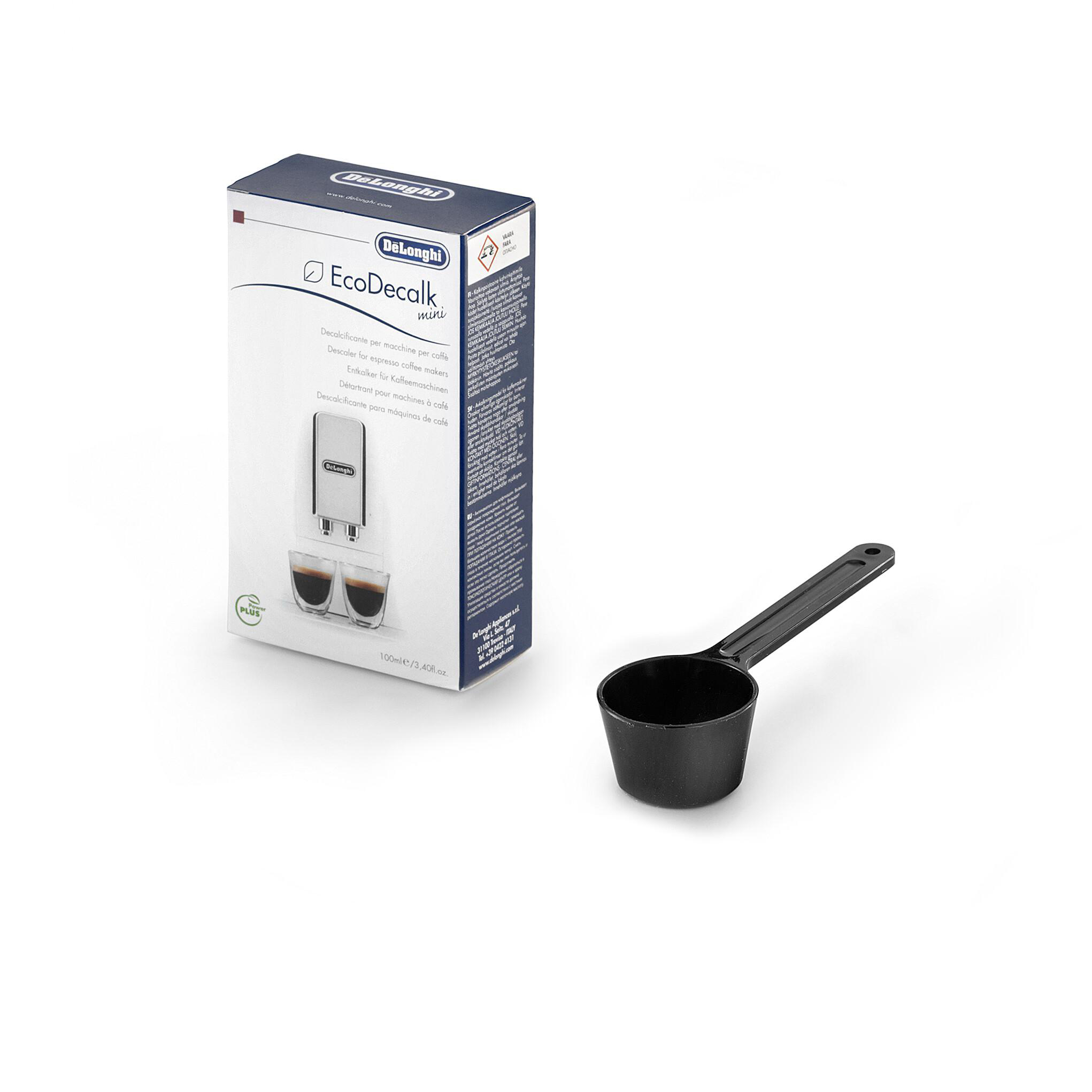 Entkalkerbox und schwarzer Messlöffel auf weißem Hintergrund. Produkt für die Kaffeemaschinenpflege.