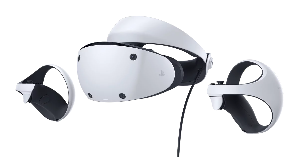Auriculares de realidad virtual blancos y negros con mandos sobre fondo negro.