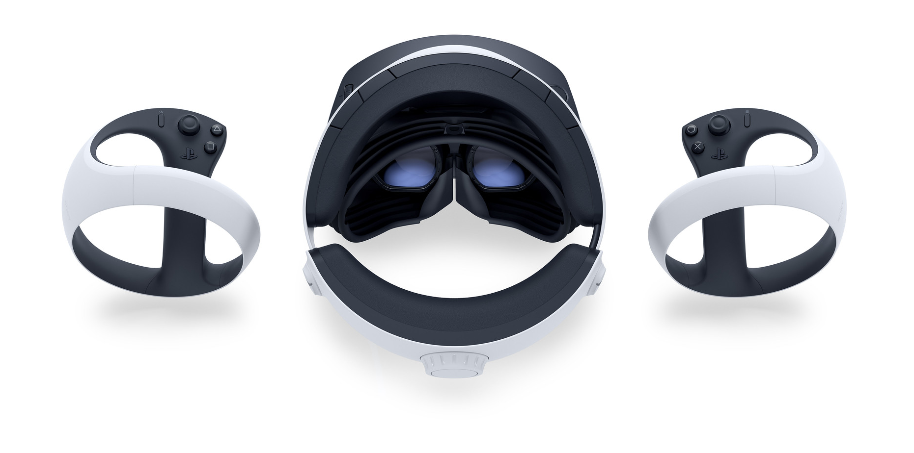 Auriculares y mandos PlayStation VR2. Los auriculares están centrados, flanqueados por los mandos.