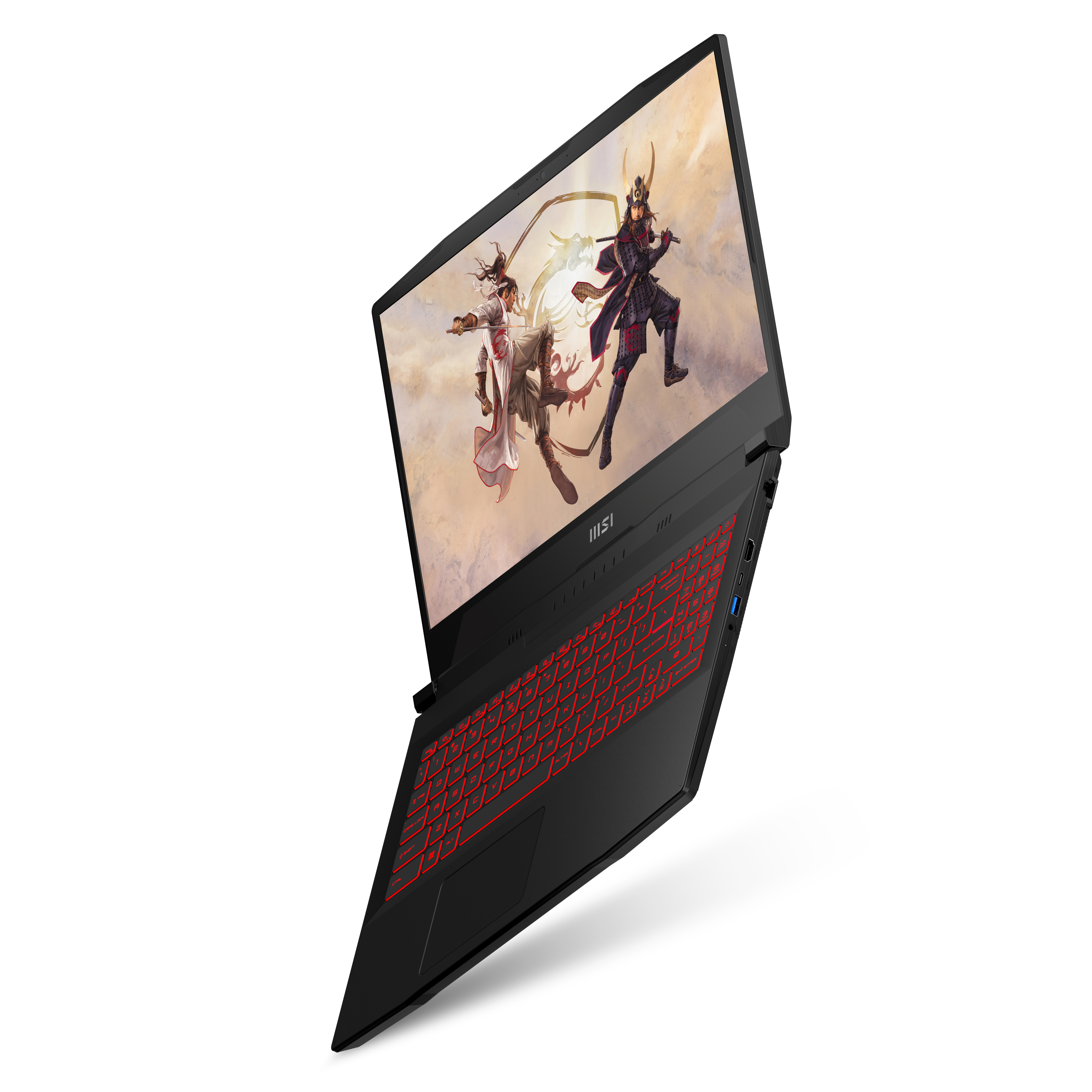 Portátil negro con teclado retroiluminado rojo. Se muestra una escena de juego en la pantalla.