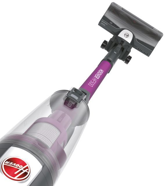 Aspirateur Hoover avec une poignée violette et un récipient à poussière transparent.