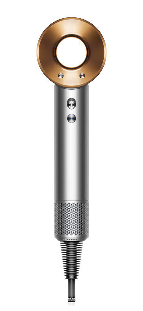 Silberner und goldener Dyson Haartrockner, freigestellt auf weißem Hintergrund.